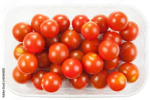 Obraz Cherry tomatoes in a plastic container on white background
