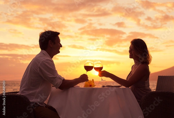 Obraz Couple enjoying romantic sunnset dinner