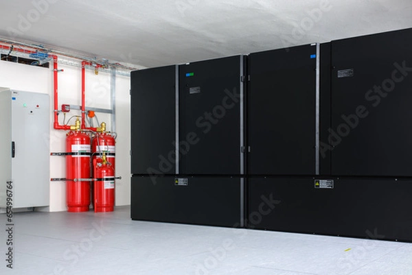 Fototapeta Clean agent fire suppression system used in data centers, backup battery rooms, electrical rooms (under 400 volts), sub-floors or tape storage libraries.
