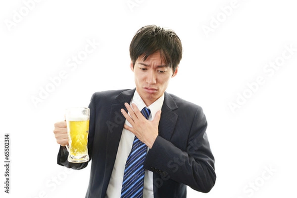 Fototapeta ビールを飲みすぎたサラリーマン