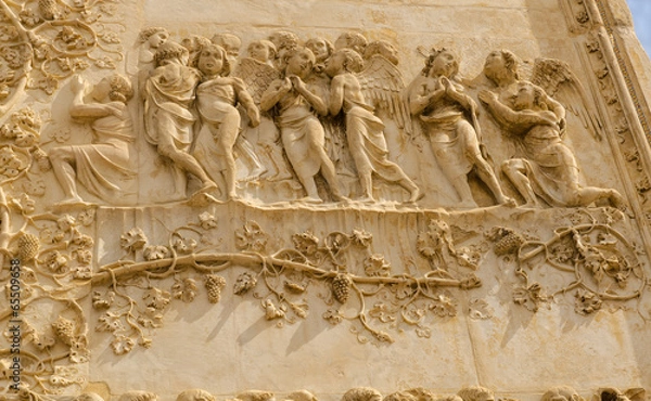 Fototapeta bas-relief, front of cathedral, Orvieto, Italy