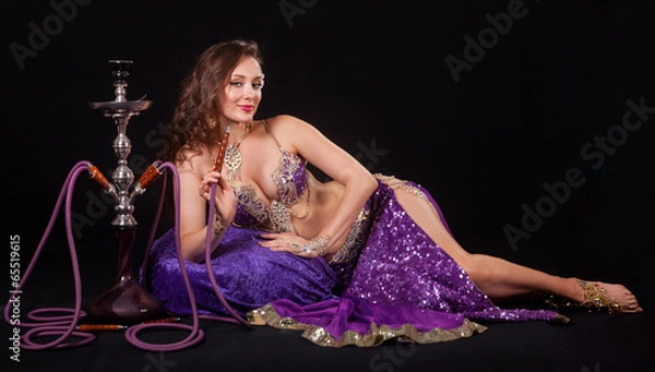 Fototapeta Seductive belly dancer with hookah
