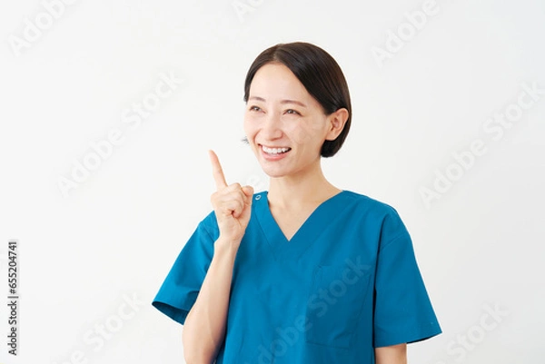 Fototapeta ひらめく女性の医者　白背景