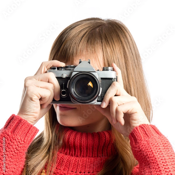 Fototapeta Girl taking a picture over white background