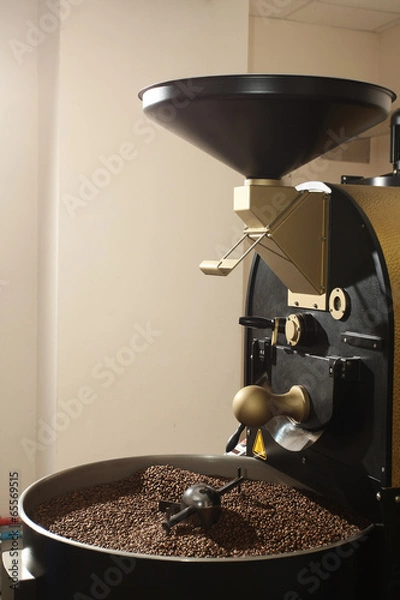 Fototapeta coffee roasting machine close-up