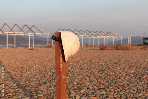 Obraz Construction helmet on a post