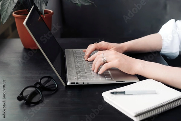 Fototapeta Productive Woman. Typing on Keyboard for Online Learning, Internet Marketing, Freelance, and Home Office. Close-Up of Woman's Hands Typing on Computer Keyboard, Work from Home, Office Workspace
