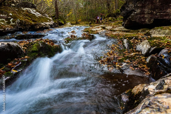 Obraz Waterfall. Tourism and travel in autumn. Holidays in the mountains.