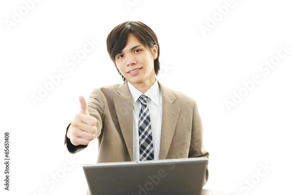 Fototapeta ガッツポーズのビジネスマン