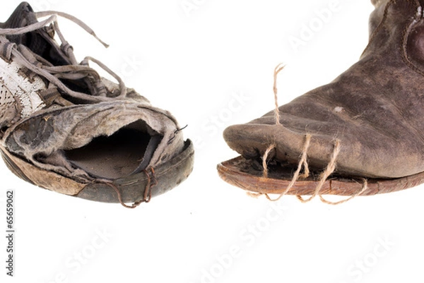 Obraz old and broken shoes