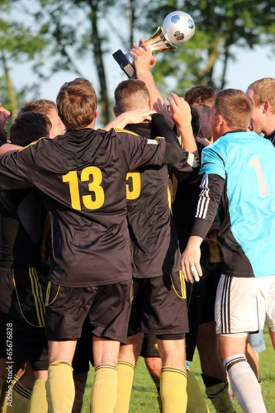 Obraz Mannschaft feiert Pokalgewinn