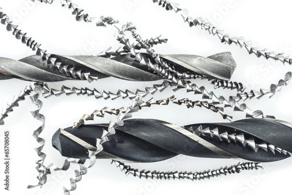Fototapeta Drills and metal shavings on white