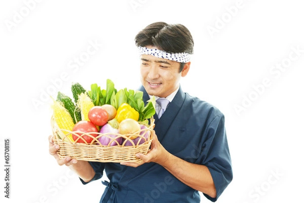 Fototapeta 野菜を持つ料理人
