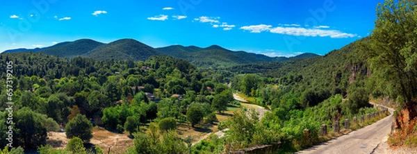 Obraz Panorama Landscape Cévennes Valley near Saint Jean. Gard. France. Europe. In the background, the Cévennes mountain range. The opportunity to walk and swim in the roach