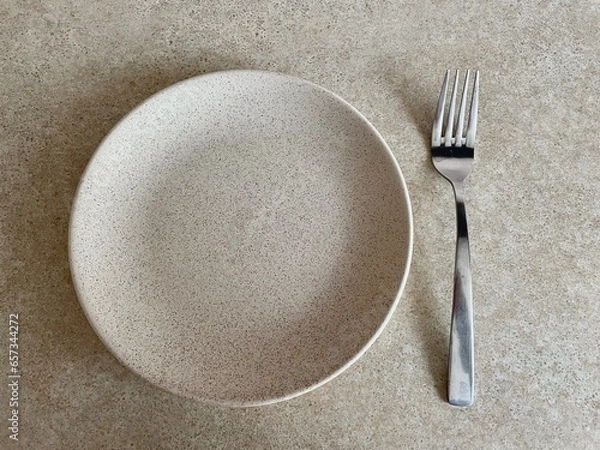 Obraz fork and knife on a plate