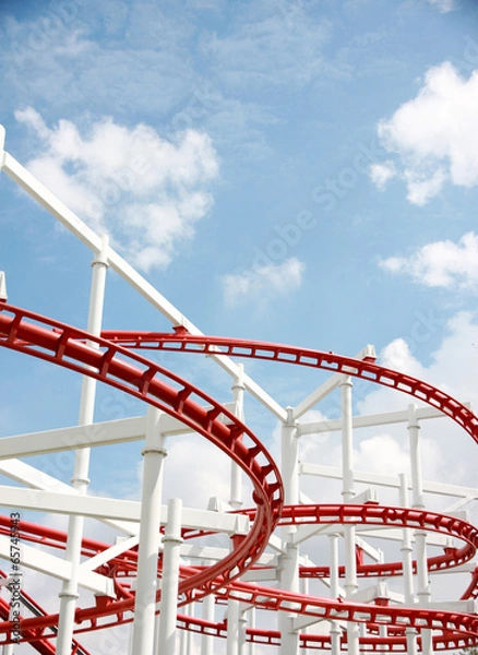 Fototapeta Roller of coaster against blue sky.