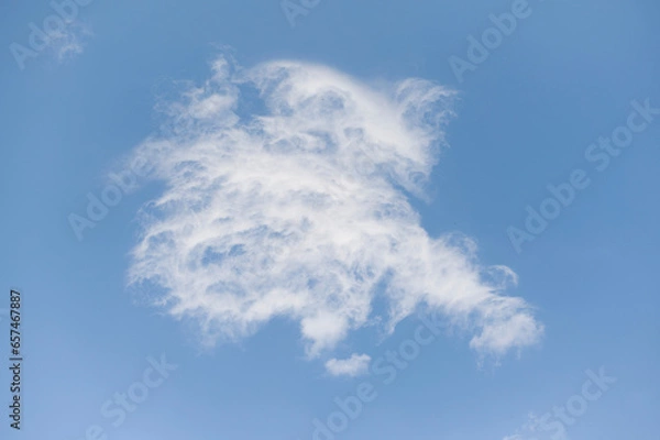 Obraz White puffy cloud on blue background. Weather conditions concept