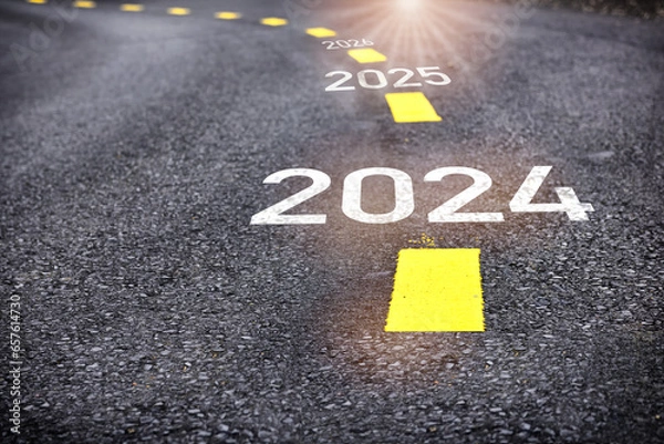 Fototapeta Year 2024 to 2026 written on the road. Business planning concept and new year beginning success idea