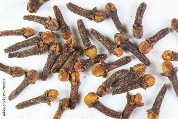 Fototapeta Clove spice and condiment. It is popular in cooking. Background for the design.