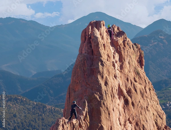 Obraz Rock Climbers with scenic background