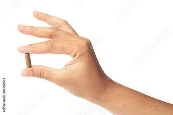 Obraz Hands with a pill herb