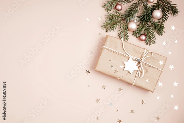 Fototapeta Christmas background with gift box. Xmas celebration, preparation for winter holidays. Festive mockup, top view, flatlay