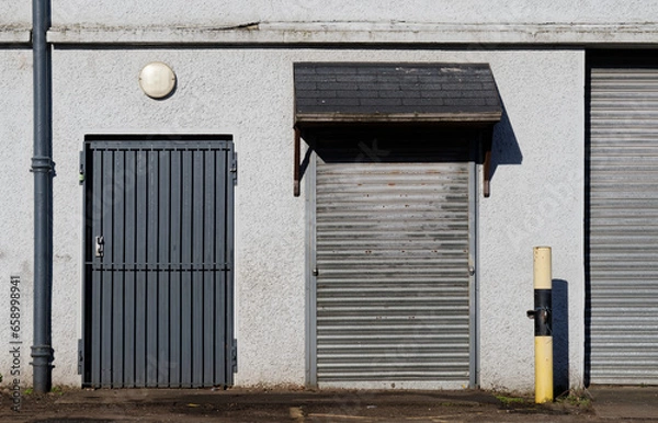 Fototapeta Office window shutters closed due to business closure
