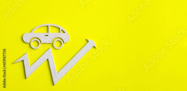Fototapeta Car value increase - Arrow on yellow background
