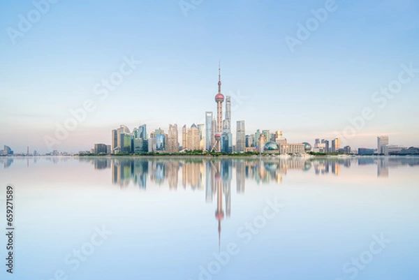 Fototapeta Illuminated Shanghai Skyline Reflecting On River	
