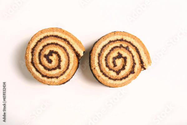 Fototapeta brioche rolls with chocolate on a white background shot from above
