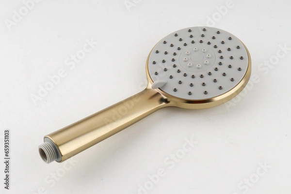 Fototapeta The Brushed Gold Round Hand Shower has a stylish brushed gold finish that adds luxury to your bathroom. Its rounded shape gives a modern look, and multiple spray settings let you customize your shower