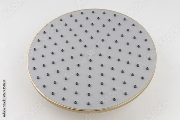Fototapeta The brushed gold large panel shower head has a sleek design that enhances your bathroom. Its wide surface ensures great water coverage for a refreshing shower experience.