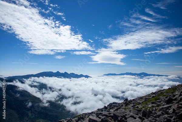 Fototapeta 蓼科山から見る雲海と美しい雲と南アルプスと八ヶ岳