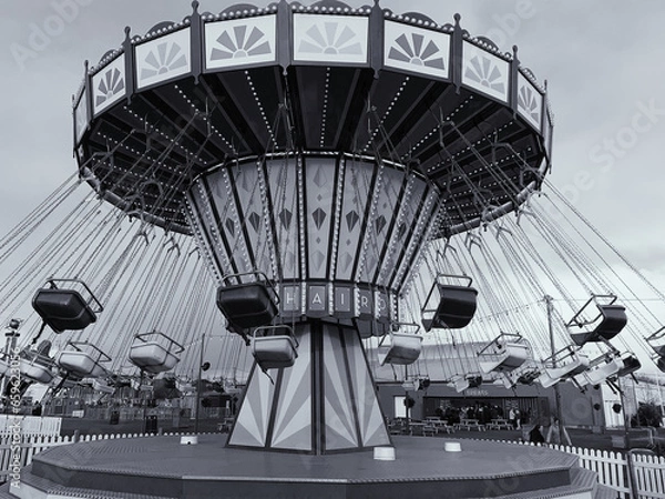 Fototapeta Monochrome picture of a carousel ride in motion