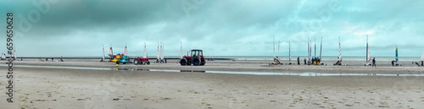 Obraz Panorama of a beach at low tide. Sand yachting activities and a tractor for transporting equipment. Coastline of Upper Normandy, France