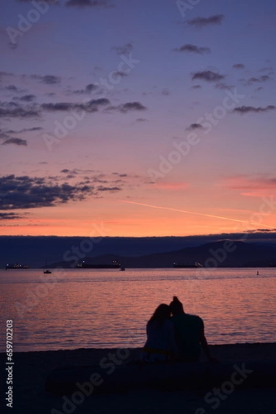 Fototapeta Romantic beach date at sunset