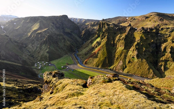 Obraz Top view of Thakgil campsite at sunset (Þakgil Camping Ground) located in a beautiful valley, surrounded by mountains, 20 km from Vík, Iceland.