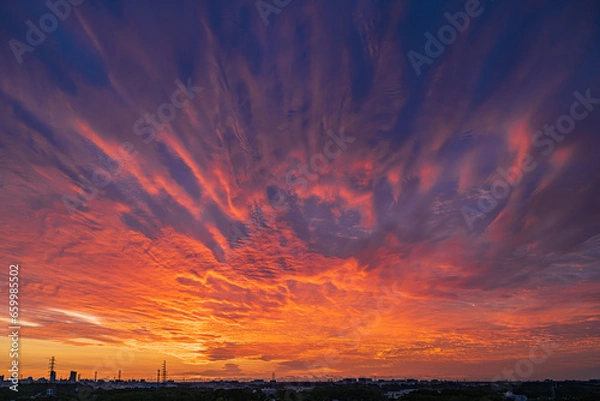 Obraz 初秋に映る一面の朝焼け雲