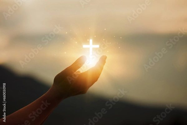 Fototapeta Human hands open palms up to worship hope with the Cross is a symbol of Christianity.Concept Religion and spirituality with believe Power of hope or love and devotion. fighting and victory for god.