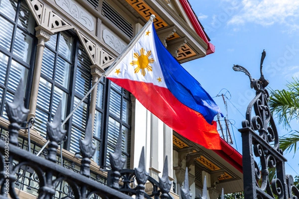 Fototapeta Philippine national flag hoisted at Malacanang Palace, Manila , Philippines
