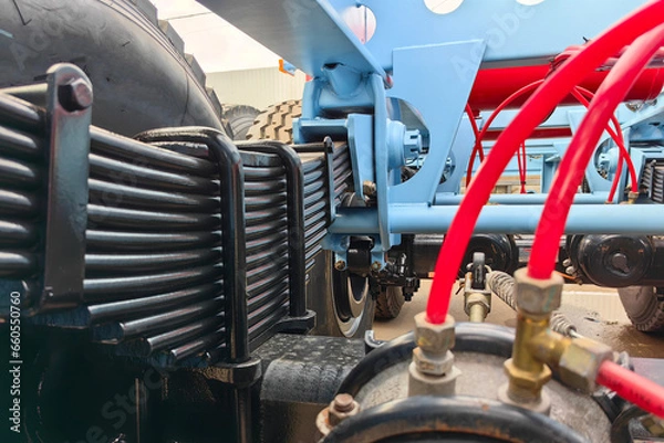 Obraz Container trailer frame and chassis, leaf springs, suspension system and pneumatic brake line.