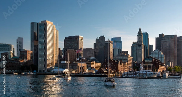 Fototapeta A view of Boston from Boston Harbor late in the afternoon on. a sunny summer day