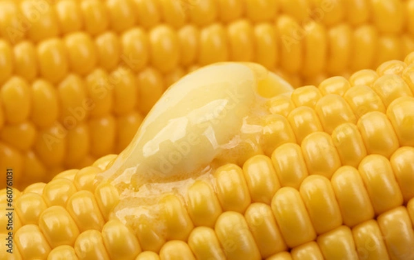 Obraz Butter melts on corn cobs