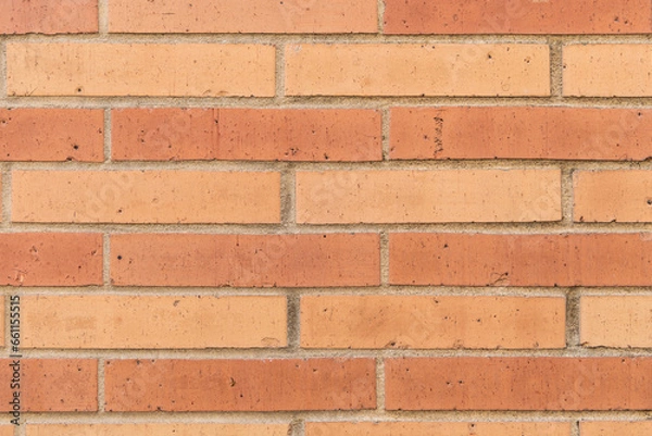 Fototapeta Textured brown backdrop. wall texture background. brick wall structure. brick masonry background. Building material concept. Surface of brickwall. Brick bonds