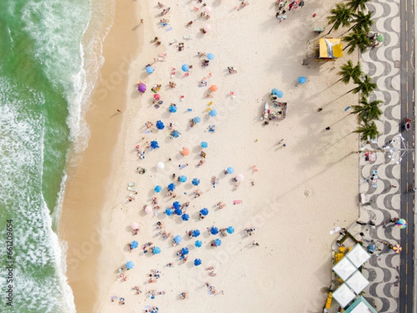 Obraz Top down aerial view of people sunbathing and enjoying summer at Copacabana Beach in Rio de Janeiro, Brazil. 