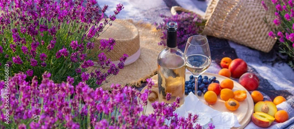Obraz wine, fruits, berries, cheese, glasses picnic in lavender field Selective focus