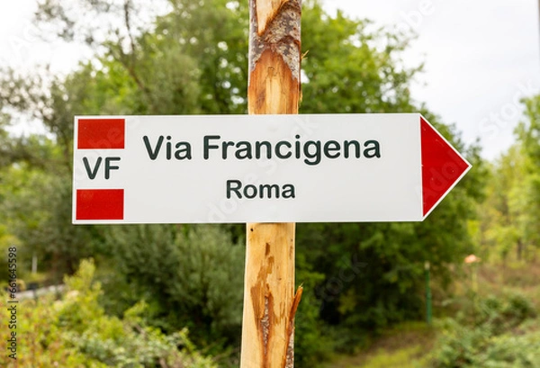 Fototapeta Via Francigena (pilgrim's route to Rome) way marker showing the direction to Rome