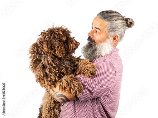 Fototapeta Studio portrait of a hipster man hugging his dog. Man playing with dog Isolated on transparent background.