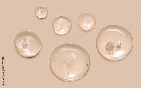 Fototapeta Serum oil sample swatch round shape texture isolated on beige background. cosmetic Hyaluronic acid retinol collagen science lab product