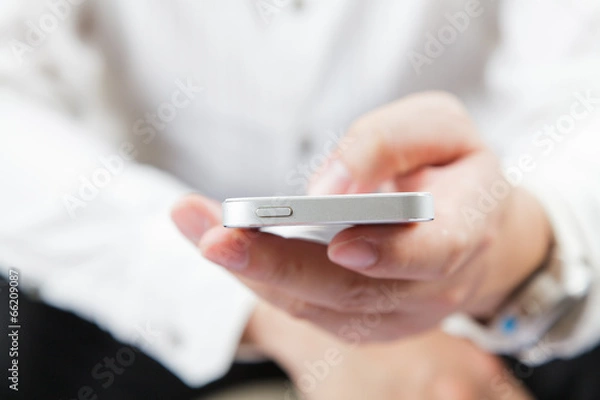 Fototapeta Man using mobile phone